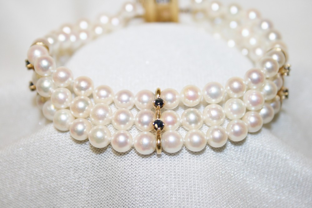Three Strand White Head-Drill Pearl & Crystal Twisted Bracelet