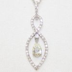 Diamond Pendant with Pear Shaped Diamond Dangle - 0.57ct.