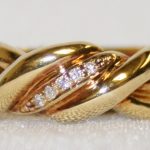 Yellow Gold Diamond Twist Ring - 0.06ct TW