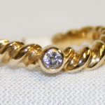 Yellow Gold Curved Rope Diamond Ring - 0.08ct.